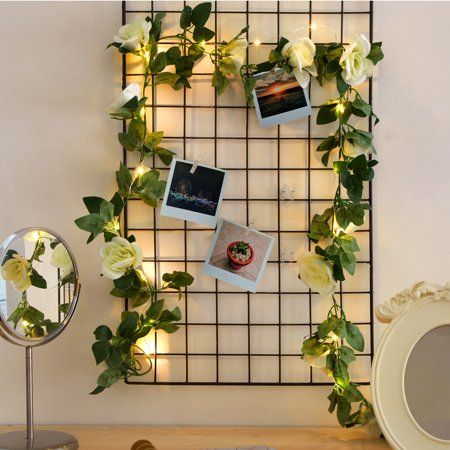 Add a romantic touch to your space with the Urban Shop Rose Vine Garland with Lights and Photo Clips. The Urban Shop Rose Garland Light with Photo Clips makes the perfect decorative accent to light up your bedroom, dorm room, living room or home office. Make your space your own with the photo clip lights! The Urban Shop Garland Light measures 8.5 feet long and includes 10 photo clips so you can hang your precious memories up with this beautiful faux rose vine garland. You can wipe the Urban Shop Indoor Roses, Garland With Lights, Vine Garland, Cubicle Decor Office, Urban Shop, Rose Vine, Work Office Decor, Clip Lights, Rose Garland