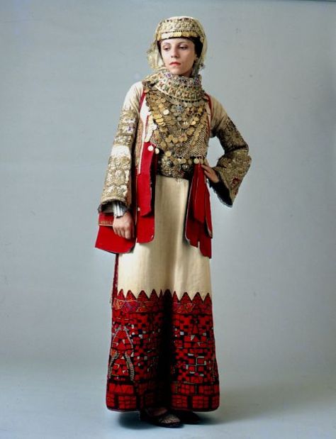 A version of the Attica bridal dress worn in villages round Athens. The chemise border embroidery composed of extremely difficult and imaginative motifs, was often covered with gold embroidery, a gift from the bride groom to the bride. 	Late 19th c. Greek Traditional Dress, Greek Dress, Bridal Dresses Vintage, Greek Costume, Costumes Around The World, National Clothes, Folk Clothing, National Dress, The Villages