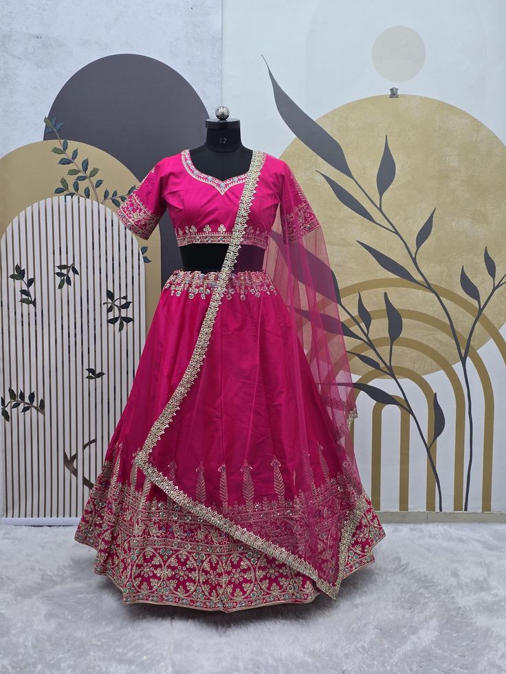 Rani pink Colour Embroidered Attractive Party Wear Silk Lehenga choli has a Regular-fit and is Made From High-Grade Fabrics And Yarn.  Lehenga Fabric :- Malay Satin Silk    Dupatta Fabric :- Heavy Butterfly Net Sequence 5mm With Fancy Border Work (dupatta size 2.40 meter)  Blouse Fabric :- Malay Satin Silk, Sequence 5mm Work  Lehenga Inner :- Micro Silk  Colour :-Rani pink  Blouse Work:- Sequence 5mm Work, Multi Needle Work, Coding Work, Embroidery Work, Zari Work  Lehenga Work :- Sequence 5mm W Pink Dola Silk Choli With Zari Work, Pink Art Silk Choli With Dori Work, Pink Choli With Resham Embroidery In Traditional Drape, Pink Choli With Resham Embroidery And Traditional Drape, Pink Choli With Resham Embroidery, Pink Choli With Dori Work In Traditional Drape, Semi-stitched Pink Dola Silk Choli, Pink Semi-stitched Dola Silk Choli, Traditional Drape Pink Choli With Dori Work