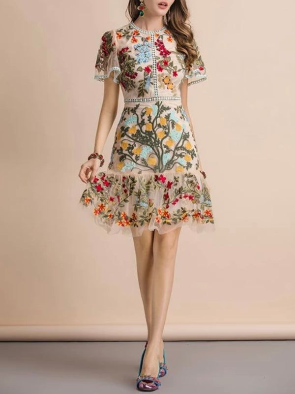 Spring A-line Floral Cocktail Dress, Knee-length Floral Print Mini Dress, V-neck Dress With Multicolor Floral Embroidery, Floral Embellished Knee-length Dress For Garden Party, Floral Knee-length Dress For Garden Party, Feminine Summer A-line Lace Dress, Spring V-neck Dress With Multicolor Embroidery, Embroidered A-line Mini Dress For Spring, Spring A-line Dress With Embroidered Hem