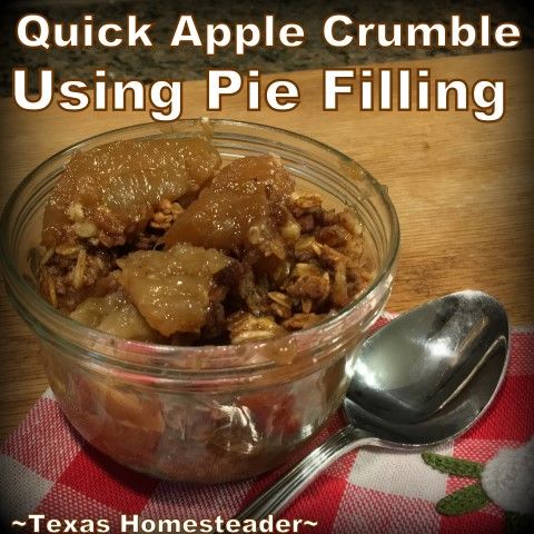 a glass bowl filled with apple crumble using pie filling