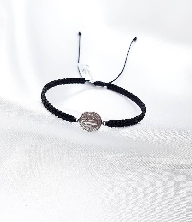 Handmade cord bracelet with silver St. Benedict medal. Adjustable with a sliding knot. Ideal for all hand sizes Medal diameter: 1.2cm and 1cm St Benedict Bracelet, St Benedict Medal, Bracelet Cord, Benedict Medal, St Benedict, Saint Benedict, Cord Bracelet, Sliding Knot, Cord Bracelets