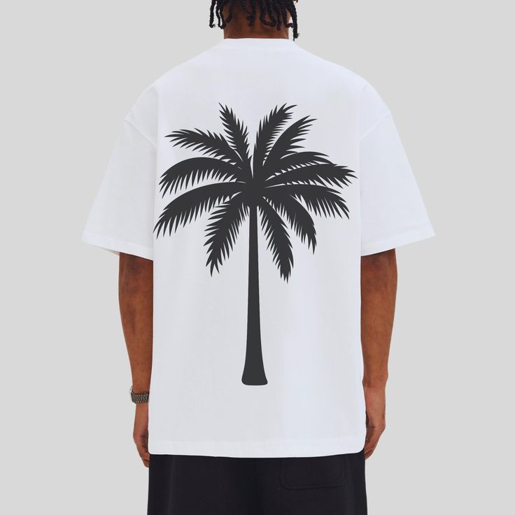 Embrace the warmth of summer with our Palm Tree T-Shirt, a perfect blend of comfort and style for your next beach getaway. This Island Tee Shirt captures the essence of a tropical paradise with its vibrant palm tree design, making it an ideal choice for anyone who loves the laid-back vibe of island life. Whether you're heading to the beach or just want to bring some sunshine into your day, this Summer Beach Shirt is your go-to for positive vibes. Made from soft cotton, this Comfy Tee Shirt offer Cheap White Tropical T-shirt, Affordable Relaxed Fit Palm Tree Print T-shirt, Cheap Palm Tree Print T-shirt For Beach Season, Relaxed Fit T-shirt With Palm Tree Print, Affordable Tropical Palm Tree Print T-shirt, Cheap Crew Neck T-shirt With Palm Tree Print, Cheap Relaxed Fit T-shirt With Palm Tree Print, Cheap White T-shirt With Palm Tree Print, Cheap Palm Tree Print Crew Neck T-shirt