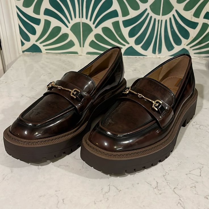 Chestnut Loafers With A Light Tortoise Pattern And Gold Hardware Never Worn! Brown Platform Loafers With Leather Footbed For Office, Brown Platform Loafers For Office With Leather Footbed, Brown Platform Loafers For Workwear, Fall Wingtip Platform Loafers For Work, Brown Leather Sole Platform Loafers For Fall, Brown Round Toe Loafers For Work, Brown Platform Loafers With Leather Sole For Fall, Brown Round Toe Platform Loafers For Business Casual, Brown Business Casual Loafers With Lug Sole