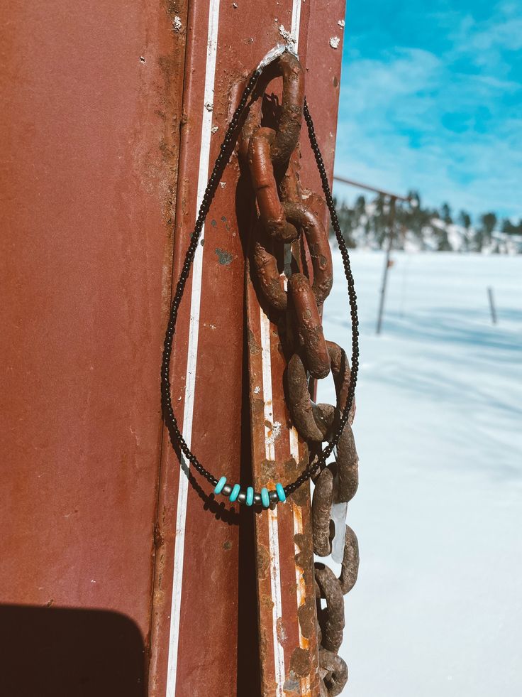 Black seed bead choker with turquoise and silver beads Tiny Beads Southwestern Jewelry, Turquoise Jewelry With Black Beads For Festival, Southwestern Beaded Chain Jewelry For Festivals, Southwestern Style Beaded Chain Jewelry For Festival, Southwestern Style Festival Jewelry With Beaded Chain, Turquoise Beaded Necklaces With Black Beads For Festival, Turquoise Beaded Chain Choker, Turquoise Beaded Choker, Adjustable Beaded Turquoise Choker