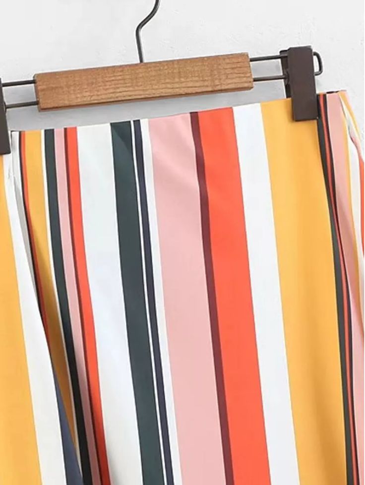 Details: 100% Polyester Midi-length Asymmetrical hem Elastic waist Sizing: (in inches) Size S M L Waist Size 26.0 27.75 29.0 Hip Size 36.0 38.0 39.5 Length 34.75 35.0 35.5 Striped Pleated Skirt For Summer, Striped Pleated Skirt Bottoms For Summer, Striped Summer Skirt, High Waist Multicolor Skort For Summer, Multicolor Flowy High-waisted Skirt, High Waist Multicolor Pleated Skirt, Multicolor Mini Skirt For Summer, Multicolor High Waist Lined Skirt, Knee-length Orange Summer Bottoms