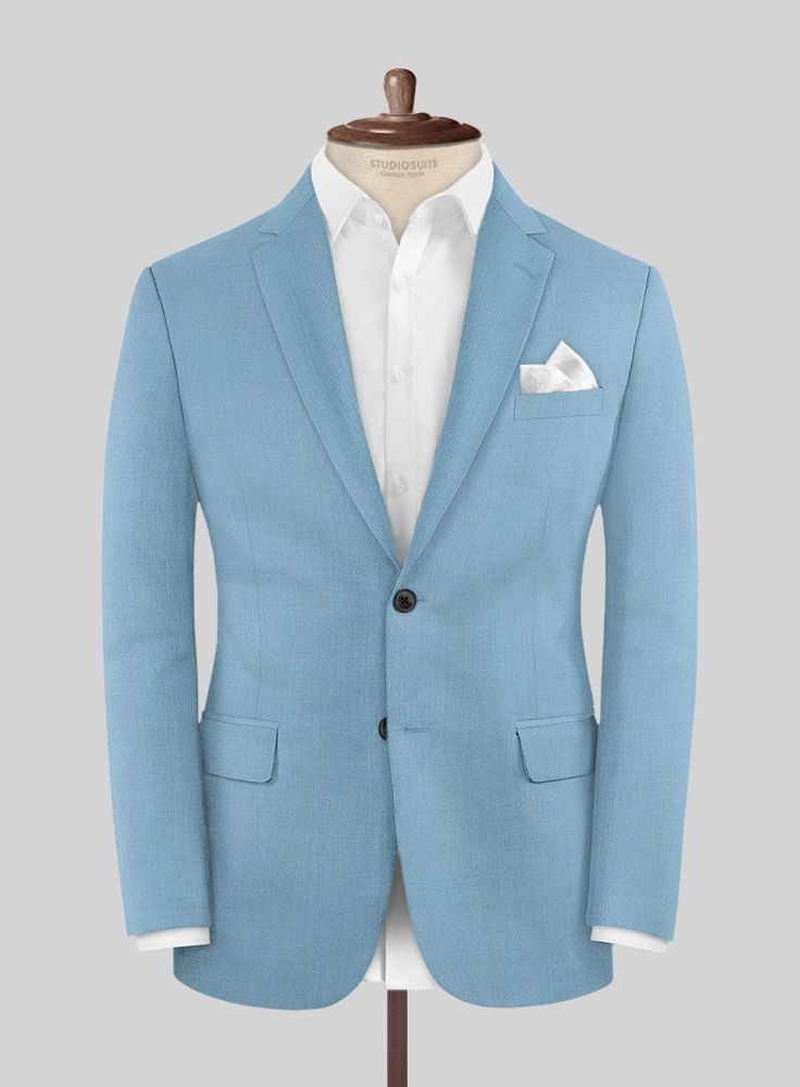 Bring some passion to your wardrobe with our finely tailored Napolean Taj Blue Wool suit. Crafted from a wool blend, the suit will make you look sharp with minimal effort and see-through event after event. Style it with a matching waistcoat, a white shirt, patterned blue tie and tanned brown derby shoes. 
 
Look Includes   Napolean Taj Blue Wool Fabric  Two Button Jacket Style  Notch Lapel  Horn Royal Black Buttons  Single Vent  Three Cuff Buttons  Two Welted Back Pockets on Trousers    Click 'C Semi-formal Suit With Welt Pockets And Suit Collar, Semi-formal Three-piece Suit With Notch Lapel And Welt Pockets, Semi-formal Suit With Welt Pockets, Tailored Single Button Suit, Tailored Single-button Suit In Suiting Fabric, Tailored Semi-formal Suit With Lapel Collar, Semi-formal Suits With Lapel Collar And Welt Pockets, Tailored Suits With Lapel Collar For Semi-formal Occasions, Semi-formal Notch Lapel Suit With Welt Pockets