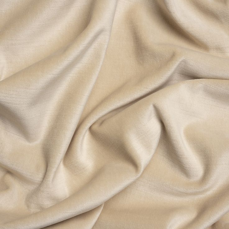 a close up view of a plain beige fabric