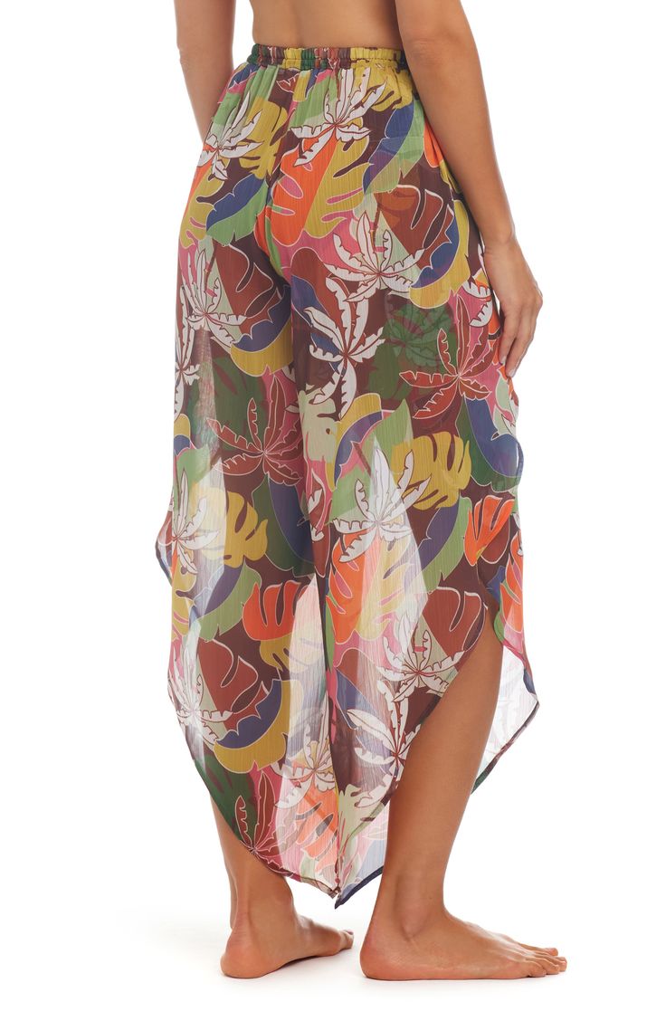 A tropical-inspired print enlivens airy cover-up pants designed with vented legs and an adjustable drawstring at the waist. Elastic/drawstring waist Side slits 100% polyester Hand wash, line dry Imported Printed Tie-side Beachwear Bottoms, Bohemian Multicolor Bottoms For Vacation, Multicolor Summer Beach Cover-up Bottoms, Multicolor Beach Pants For Beach Season, Multicolor Beach Vacation Pants, Multicolor Pants For Beach Vacation, Multicolor Pants For Vacation And Beach Season, Multicolor Summer Beach Pants, Beachy Floral Print Tie-side Bottoms