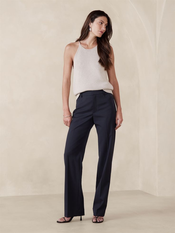 Crafted from our signature luxurious lightweight wool, this straight pant uses a bit of stretch for all-day comfort and has a longer inseam to wear with your favorite heels.  A high waist and straight leg adds length to every step.  Breathable, Wrinkle-Resistant.  High Rise Straight Fit: Slim hip and thigh, with a straight, stovepipe-style fit through the leg.   Extra long - so you can wear them with heels.  Responsible Wool Standard Certified : This global standard protects the sheep that suppl Sheep Fabric, Professional Work Outfit, Slim Hips, Petite Shorts, The Sheep, Wool Pants, Pants Straight, Bottom Clothes, Straight Pants