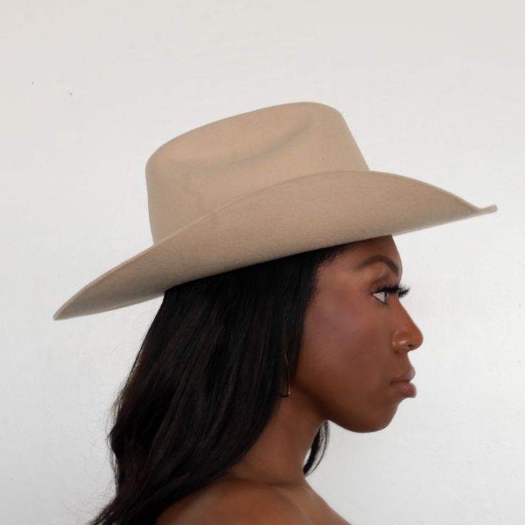 The Upland Western Cowboy Hat seamlessly blends the rustic charm of the Wild West with a dash of futuristic boho flair. With its distinctive cowboy silhouette, complete with a cattleman creased crown and a stylish upturned brim, this hat exudes classic Texan allure. The leather band is adorned with gleaming silver jewels, adding a contemporary twist to this timeless fashion statement. Handcrafted and meticulously embroidered with the initials "BTR," this hat exemplifies the perfect fusion of tra Fitted Panama Hat For Western-themed Events, Fitted Brimmed Hat For Rodeo, Rustic Hats For Rodeo, Fitted Brimmed Rustic Fedora, Western Brown Boater Hat With Flat Crown, Rustic Flat Brim Hat For Rodeo, Rustic Rodeo Hat, Country Style Hat With Flat Crown For Country Events, Rustic Top Hat With Flat Brim For Country Events