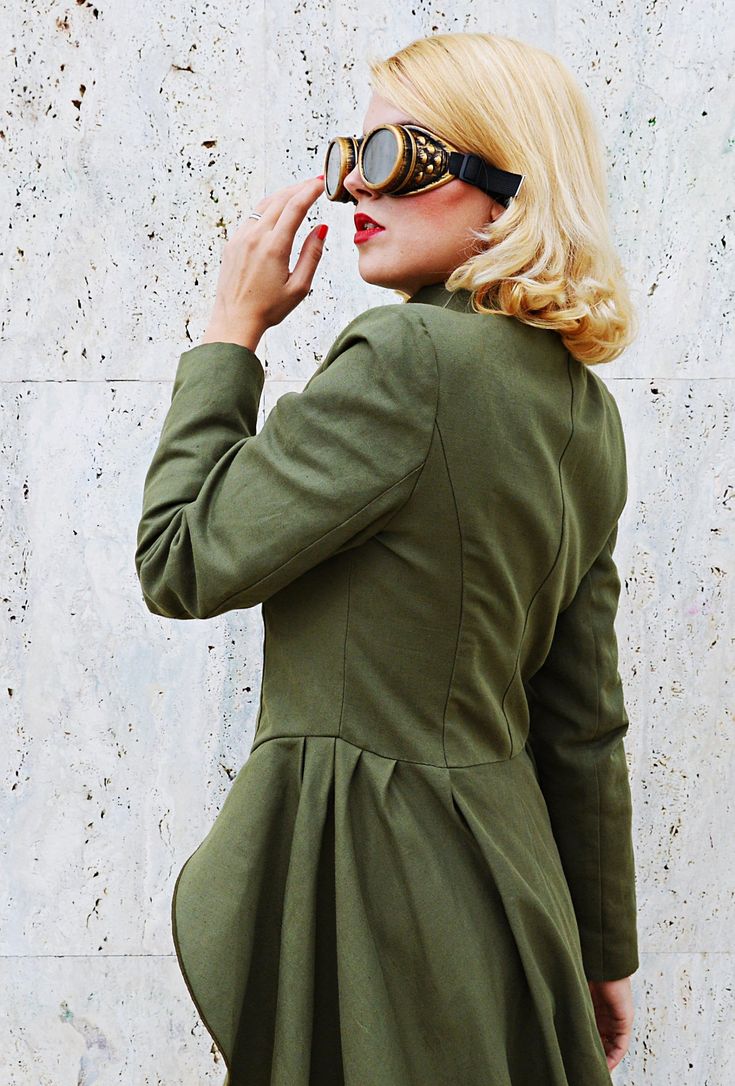 Steampunk cotton swing coat made of green cotton. Authentic military army jacket with satin lining.Flower hand painted jacket. Material: 100% cotton Care instructions: Dry clean only The model in the picture is size S. Can be made in ALL SIZES. If you have any other specific requirements, do not hesitate to contact me! I DO NOT CHARGE EXTRA MONEY for custom made items. All you need to do is send me your measurements. Below, you will find a table with size references. How to get an accurate measu Fitted Khaki Pea Coat With Long Sleeves, Khaki Military Style Winter Blazer, Military Style Green Blazer For Fall, Fall Military Style Green Blazer, Fall Military Green Blazer, Fitted Green Military Outerwear, Fitted Military Style Pea Coat With Long Sleeves, Fitted Military Pea Coat, Fitted Military Style Long Sleeve Pea Coat