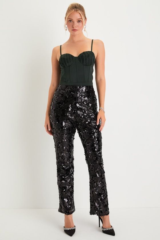 Your sparkling presence in the Lulus Glittery Charm Black Sequin High Rise Trouser Pants is sure to keep all eyes on you! These outstanding pants feature an array of dazzling sequins (of various sizes) that decorate a sheer lace overlay (atop a matching knit liner) as it shapes a high, banded waist and straight pant legs that fall to ankle-length hems. Hidden clasp closure and zipper fly. Fit: This garment fits true to size. Length: Ankle length. Size medium Inseam: 30.25 Front Rise: 12.25 Waist Chic Fitted Bottoms With Contrast Sequin, Embellished Bottoms For Evening Parties, Embellished Evening Bottoms For Party Season, Embellished Bottoms For Evening Party Season, Embellished Bottoms For Evening And Party Season, Party Glitter Bottoms For Party Season, Shimmer High Waist Bottoms For Party, High Waist Shimmer Bottoms For Party, Black Embellished Bottoms For Party Season