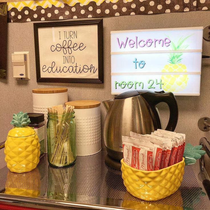 a coffee bar with pineapple mugs and signs on the wall above it that say welcome to registration