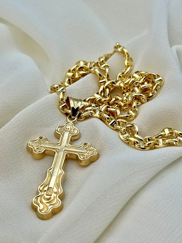 18k Gold Cross Necklace , 11.30 gr , 22" ,3.5mm. Let me know if you want any sizes . Priced to sell! Compare our prices to other similar sellers! Arrives in a GIFT BOX and includes FREE SHIPPING within the USA and Canada. International shipping is available at the most economical rates on ETSY. I HAVE BEEN IN THE JEWELRY BUSINESS ALL MY LIFE. I am a second -generation family member making gold and jewelry. Please feel free to ask me any questions - Always happy to help! Fast Replies to messages! Crucifix Cross Necklace With Curb Chain As Gift, Crucifix Cross Necklace With Curb Chain For Gifts, Gold Cross Figaro Chain Necklace, Figaro Chain Necklace With Cross Pendant As Gift, Gold Figaro Chain Cross Necklace, Gold Figaro Chain Necklace With Cross Pendant, Gold Figaro Chain Necklace With Cross Shape, Yellow Gold Cross Pendant Chain Necklace As Gift, 14k Stamped Cuban Link Necklace For Gift