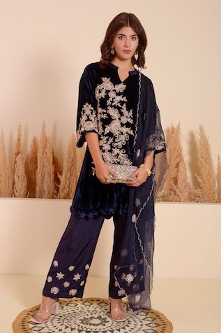 Blue three fourth sleeves velvet A-line kurta with midnight bloom embroidery using moti and tonal sequins encrustments. Paired with a matching sequin bloom butti velvet pant. - Aza Fashions Velvet Palazzo Set With Dupatta, Festive Semi-stitched Velvet Kurta, Festive Blue Velvet Sets, Party Velvet Embroidered Kurta, Luxury Semi-stitched Velvet Sets, Semi-stitched Velvet Long Sleeve Kurta, Embroidered Semi-stitched Velvet Kurta, Velvet Kurta, A Line Kurta