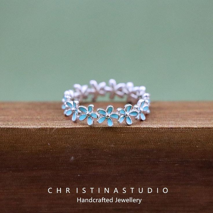 S925 Sterling Silver blue-green floral ring，gifts for her Round Gift Box: https://www.etsy.com/uk/listing/1727299749/add-on-products-grey-green-and-claret?ref=listings_manager_table Timeless Bonds Series: Express your love to your girlfriend, partner, wife, daughter, mother, bride, and new mother with our meticulously crafted pieces.  You've Found A Gem   ♥Real, Authentic Gemstone ♥Material: silver Size: Width 5.5mm  ♥We Only Work With 925 Sterling Silver or Solid 9K, 14K Gold - Never Fast Fashi Blue Sterling Silver Promise Flower Ring, Blue Sterling Silver Promise Ring, Blue Flower Ring For Anniversary, Blue Flower-shaped Jewelry For Her, Green Emerald Flower Ring For Anniversary, Green Flower Ring For Anniversary, Blue Flower Shaped Dainty Jewelry, Blue Flower-shaped Dainty Jewelry, Green Sterling Silver Flower Ring For Wedding