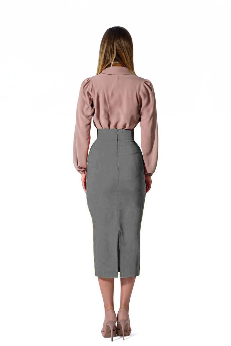 This midi skirt is crafted from high-quality grey cotton, with a soft feel and timeless style. The skirt is lightweight and features an elastic waistband for a comfortable fit. Perfect for formal and casual looks. Product Features Please Compare your Measurements To our Size Chart Before Purchase Fully Lined Fitted waist Center back seam with invisible zipper Regular fit- true to size Skirt Length is 30 Inches from Waist Hand Wash with mild soap. Fabric is a 100% Cotton Crepe Delivery Time This Gray Knee-length Workwear Bottoms, Gray Knee-length Bottoms For Workwear, Fitted Gray Skirt With Pockets, Gray Fitted Skirt With Pockets, Business Casual Midi Length Bottoms For Fall, Gray High Waist Skirt For Work, Gray Workwear Skirt With Pockets, Chic Gray Knee-length Bottoms, Gray Long Skirt For Workwear