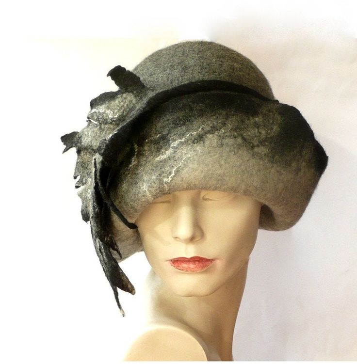 Millinery unique hat,Felt hat, cloche hat, Felted Hat, Women hat, Cloche hats, felt hats, felt cloche, Retro hat La belle epoque, Art Deco, 1920s hat Art Hats, Grey ,White , hat cloche Formal hat, Felt formal hat Wool Merino wool Beautiful HAT ! Great shape, beautiful color - shades of grey. The hat is made from the highest quality materials (100% Australian merinowool). Soft, pleasant to the touch. Very flattering ! Special and unique ! Sophisticated and elegant ! As the base for my works I use Brimmed Felt Cloche Hat For Winter, Winter Felt Brimmed Cloche Hat, Winter Felt Cloche Hat With Brim, Gray Winter Cloche Hat With Curved Brim, Fitted Gray Wool Hat, Elegant Gray Felt Hat With Short Brim, Elegant Gray Brimmed Felt Hat, Elegant Gray Wide Brim Felt Hat, Winter Felt Cloche Hat With Short Brim