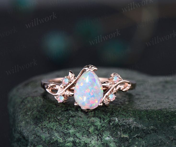 - Metal: Solid gold(10K/14K/18K white/yellow/rose gold),925 sterling silver,platinum available- Main Stone: 6x8mm pear lab opal- Accent Stone: natural amethysts- Band Width: 1.4mm- Can be personalized: Yes Pear Shape Opal Engagement Ring, Engagement Ring With Opal, Chicken Wedding, Opal Wedding Ring Set, White Opal Engagement Ring, Engagement Ring Opal, Opal Engagement Ring Rose Gold, Opal Engagement Rings, Opal Wedding Ring