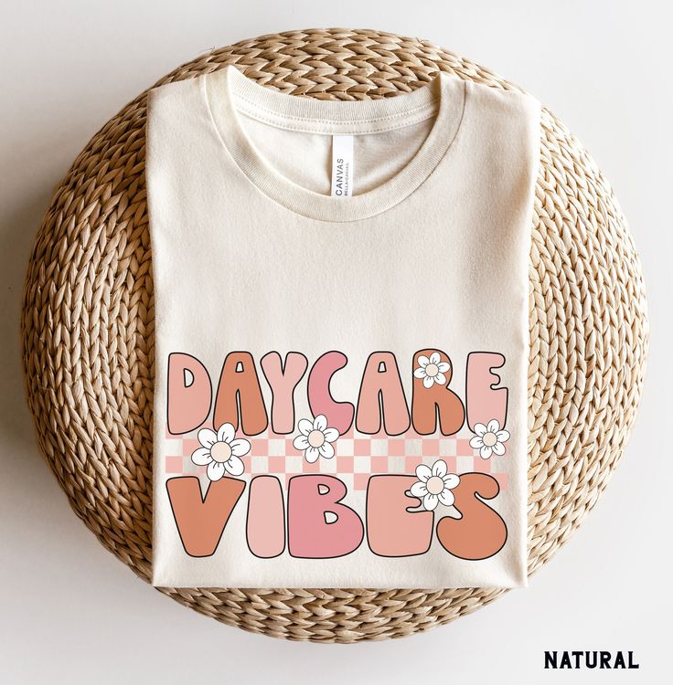 Daycare Vibes Shirt, Daycare Teacher Shirts, Daycare Crew Shirts, Back to School Shirt, Retro Daycare Tee, Daycare Teacher Gift More Grades and Styles Here: https://www.etsy.com/shop/TheGraphicPeach?ref=seller-platform-mcnav§ion_id=34195008 For environmental and human friendly reason, this product is only made when you order. Turnaround time is usually 1-5 business days before shipping, but can increase during holiday periods. Our professional printers always strive to ship as quickly as possible, but faster times are not guaranteed. Our printer uses direct-to-garment printing to make our products. The design ink is sprayed on, then allowed to soak into the fibers of the garment. This process yields fine quality prints and a smooth finish on the garment. BELLA + CANVAS UNISEX T SHIRT The B Daycare Teacher Shirts, Daycare Teacher Outfits, Preschool Vibes, Daycare Teacher Gifts, First Day Of Preschool, Preschool Teacher Shirts, Crew Team, Preschool Shirts, Daycare Teacher