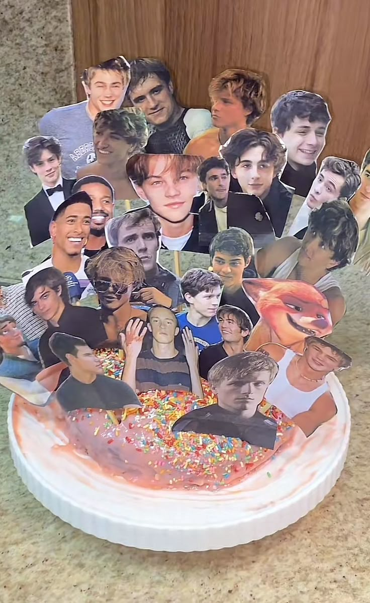 a cake with many pictures of the same person on it