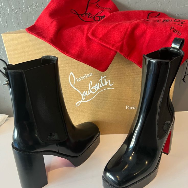 Christian Louboutin Loubirain Calf-High Rain Boots. Black With Outsole. 3 In Heel. Size 39. Never Worn. Designer Patent Leather Heeled Boots With Reinforced Heel, Designer Patent Leather Boots With Sculpted Heel, Luxury Heeled Boots With Red Sole And Round Toe, Evening Patent Leather Boots With Red Sole, Designer Boots With Reinforced Block Heel, Designer Black Block Heel Boots, Party Boots With Red Sole And Square Toe, Designer Patent Leather Boots With Reinforced Heel, Designer Ankle Boots With Red Sole