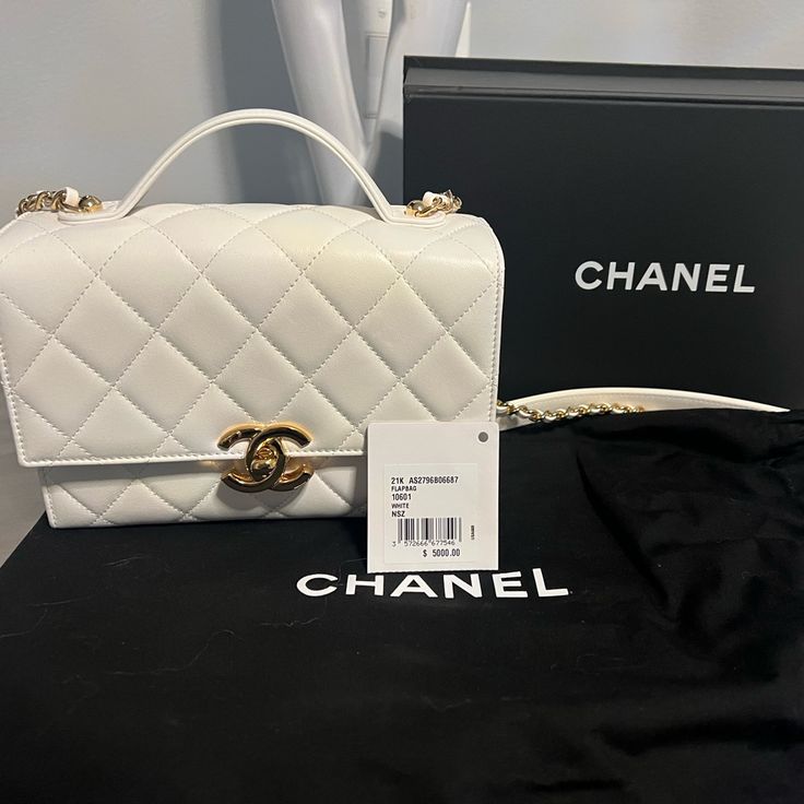 Authentic Chanel. White And Gold Mini Purse White Luxury Flap Bag With Gold-tone Hardware, High-end White Flap Bag For Travel, High-end White Shoulder Bag For Travel, High-end White Bag With Top Carry Handle, Classic White Flap Bag With Gold-tone Hardware, High-end White Crossbody Flap Bag, High-end White Flap Bag For Evening, High-end White Shoulder Bag With Top Handle, High-end White Shoulder Bag With Top Carry Handle