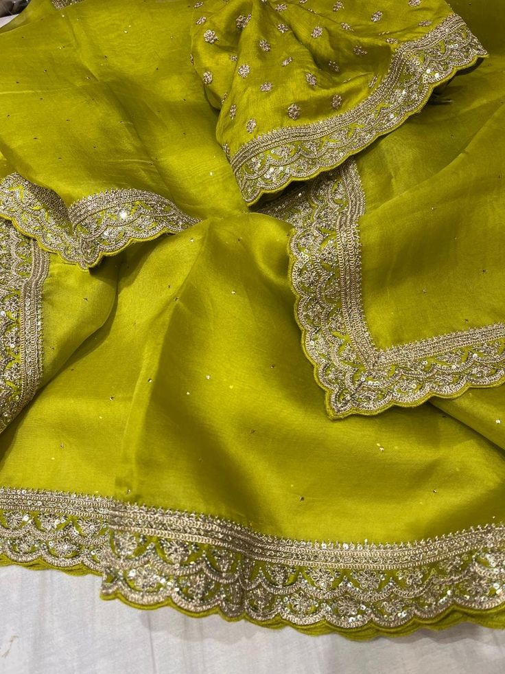 Item....Party wear saree FabricOrganza silk saree and velvet blouse piece Work...Mukesh Embroidary work Length...Saree 5.5 mtr Bp...1 mtr approx Care....Dry Wash Green Art Silk Pre-draped Saree With Embroidered Border, Dola Silk Pre-draped Saree With Sheer Dupatta For Diwali, Festive Dola Silk Pre-draped Saree With Embroidered Border, Wedding Pre-draped Chinon Saree With Embroidered Border, Festival Pre-draped Saree With Embroidered Border In Tissue Silk, Pista Green Organza Pre-draped Saree For Diwali, Traditional Party Pre-draped Saree In Chanderi, Festive Green Pre-draped Saree With Embroidered Border, Pista Green Raw Silk Pre-draped Saree For Diwali