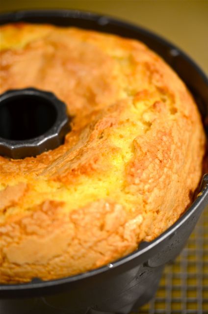 a bundt cake in a pan on a cooling rack