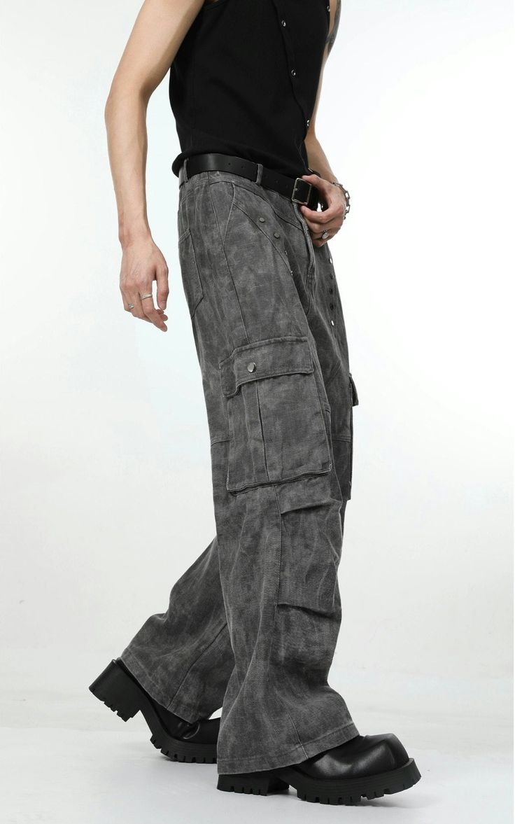 Experience the ultimate blend of style and utility with our Faded Camo-Wash Multi-Pocket Cargo Trousers, designed for the modern go-getter. Meticulously crafted from 100% cotton, these pants are the epitome of durability meets comfort. The soft, breathable fabric ensures a fit that's as functional as it is fashionable, offering a relaxed sensation with every wear. Adorned with utility pockets, these trousers embody a practical yet edgy aesthetic, perfect for those who value both form and conveni