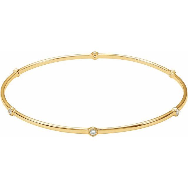 Product Description: For the perfect accent to complete any look, choose this finely crafted bezeled bangle. Adorned in bezeled diamonds, this luxurious piece is available in 14k yellow gold or sterling silver, making it an elegant addition to any outfit. Effortlessly chic and timeless, the bezeled bangle is gorgeous when worn alone or can be elegantly stacked together. Product Details: Material: Available in 14K Yellow Gold or Sterling Silver .25 ctw diamonds Bracelet size: 8" bangle Classic Bangles, Stackable Bangles, Bangle Silver, Diamond Bangles Bracelet, Gold Bangles Design, Bangles Style, Bezel Set Diamond, Gold Band Ring, Rose Yellow