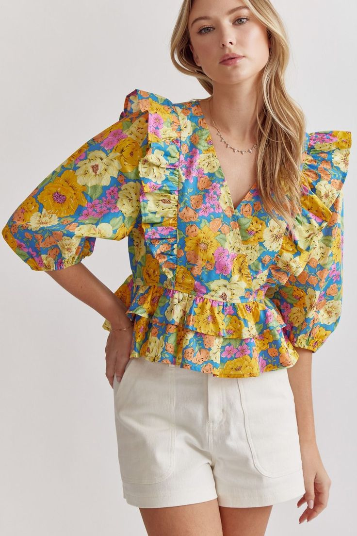 Unleash your inner fashionista with our floral print v-neck peplum top! The stylish 3/4 sleeves and ruffle detail add a touch of femininity while the snap button closure provides convenience. This lightweight and non-sheer top is perfect for any occasion - from casual gatherings to dressy events! Top Print Design, Modern Tops For Women, Cotton Top Design, Printed Top Design, Floral Summer Tops, Causal Chic Outfits, Orchid Blue, Text Codes, Fancy Shirt