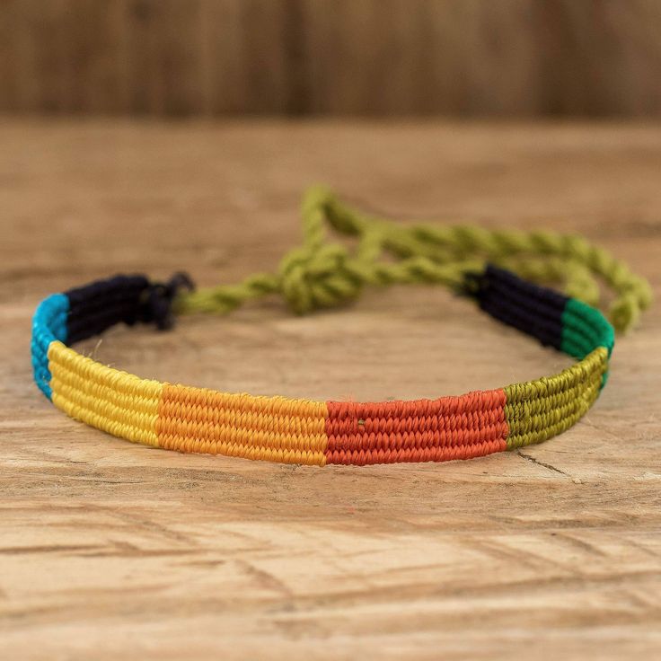 Colorful designs always add a touch of joy and youthfulness to any outfit. This gorgeous wristband made of nylon will brighten your days with its multicolor pattern, and it is perfect for wearing everywhere as you can easily tie it around your wrist. The artisans of Panabaj weave these lovely creations on a small loom, adding a little piece of Guatemala in every design. Hippie Multicolor Adjustable Friendship Bracelets, Multicolor Nylon Cord Braided Bracelet, Casual Rainbow Friendship Bracelets With Sliding Knot, Bohemian Nylon Cord Friendship Bracelets For Summer, Handmade Multicolor Wristband For Summer, Multicolor Braided Nylon Cord Friendship Bracelets, Multicolor Adjustable Band Bracelets For Friendship, Casual Rainbow Bracelets With Sliding Knot, Adjustable Rainbow Friendship Bracelets With Sliding Knot