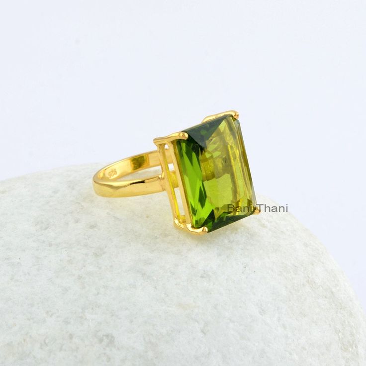 Beautiful Peridot Quartz Rectangle 12x16 mm Prong Set Sterling Silver Ring, Silver Peridot Ring for Birthday Gift Item Description Metal: 925 Sterling Silver Plating: Sterling Silver Stone Detail: Peridot Quartz (Lab Created ), Rectangle, 12x16 mm * Please note that there will be slight variations in stone texture and color shades in the actual product that you receive. Stone quality or grade will be same. * All our jewelry is Micron Plated which is higher quality as compared to Standard Plating Square Cut Crystal Gemstone Ring Gift, Emerald Ring With Rectangular Stone As Gift, Hallmarked Square Cut Ring As A Gift, Square Cut Gemstone Rings For Gifts, Gift Emerald Ring With Rectangular Stone, Rectangular Emerald Ring As A Gift, Rectangular Birthstone Ring Gift, Rectangular Birthstone Ring As Gift, Rectangular Birthstone Ring For Gift