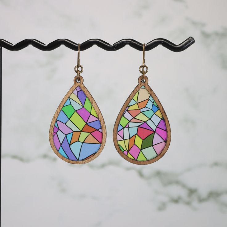 "A fun and colorful Kaleidoscope pattern printed on clear acrylic with wooden 1/8\" outline. These earrings measure approx. 2.25\" long and are very lightweight. Made with natural brass findings. Thanks!" Geometric Multicolor Earrings As Gift, Geometric Multicolor Earrings For Gift, Multicolor Geometric Earrings For Gift, Multicolor Plastic Dangle Earrings, Hand Painted Multicolor Dangle Earrings, Kaleidoscope Jewelry, Multicolor Resin Teardrop Earrings, Laser Engraved Earrings, Adjustable Multicolor Glass Earrings