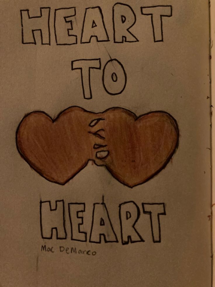 a drawing of two hearts with the words heart to heart