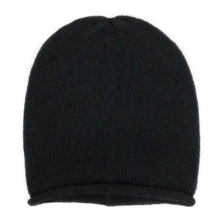 Looking for a stylish yet cozy beanie that can keep you warm in any season? Look no further than our Black Essential Knit Alpaca Beanie! The alpaca fiber used to make this beanie is considered one of the softest, most natural, and greenest fibers in the world, prized for its unique silky, and luxurious feel. It's less prone to pilling, so you can enjoy the softness for years to come. This classic beanie is hand-knitted by a weaving collective in Peru, making it an ethical and sustainable fashion Luxury Wool Classic Beanie, Luxury Black Beanie Hat, Cozy Alpaca Hats For Fall, Knitted Alpaca Hat For Fall, Cashmere Soft Knit Beanie, Alpaca Soft Knit Beanie, Soft Knit Alpaca Beanie Hat, Soft Knit Alpaca Beanie, Fall Alpaca Knitted Beanie