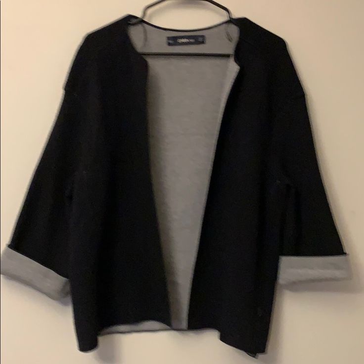 Zara Knit Black/Gray Jacket Size S. This Is A Nice Knitted Black/Gray Jacket. The Inside Of This Jacket Is Gray. The Sleeves Can Be Cuffed And The Gray Will Show. This Is A Unique Jacket. Never Worn!! Black Sweater For Spring Layering, Black Sweater For Work In Spring, Casual Black Outerwear For Layering, Zara Black Sweater For Winter, Zara Black Winter Sweater, Zara Black Outerwear For Layering, Zara Black Knit Sweater, Black Cardigan For Workwear In Spring, Black Sweater Coat For Workwear In Spring