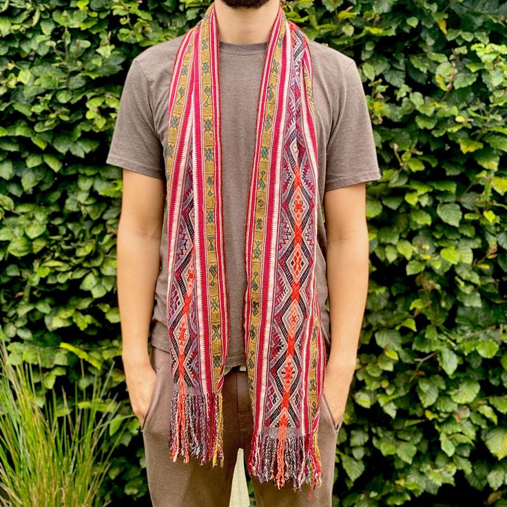 Embrace the rich heritage of the Q'ero people of Peru with this beautifully handcrafted vibrant colored alpaca scarf with beautiful sacred motifs.  Made from soft, warm alpaca wool, this scarf is not only a reflection of traditional craftsmanship but also a piece of living culture. The intricate designs and vibrant colors are woven with care, reflecting the ancestral symbols and spiritual traditions of the Q'ero community, known as the last descendants of the Inca. It can also be used as a table Cloth Wall Art, Alpaca Scarf, Altar Cloth, Intricate Designs, Alpaca Wool, Descendants, Keep Warm, Wearable Art, Festival Season