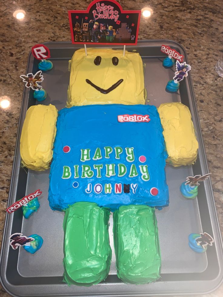 a birthday cake made to look like a cartoon character