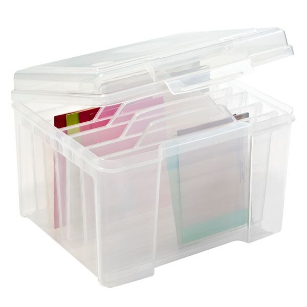 a clear plastic storage box filled with files and folders