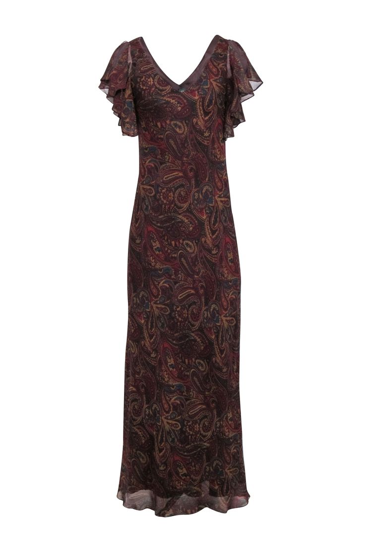 Make a stylish statement in this Lauren Ralph Lauren maxi dress! The precious paisley print in maroon, teal, and tan is perfect for an autumn event. With an elegant maxi length and romantic ruffled shoulder detail, you'll turn heads in this unique dress. Go glam with a strappy gold heel or add a pop of color with teal pumps. Size 10 100% Silk Lined Pullover V-neck Ruffled shoulder detail Maxi length Light fraying blemish at v-neckline Bust 34" Waist 30.5" Shoulder to hem 62.5" Elegant Brown Floral Print Maxi Dress, Elegant Paisley Print Maxi Dress For Fall, Elegant Sleeveless Maxi Dress With Paisley Print, Elegant Sleeveless Paisley Print Maxi Dress, Elegant Sleeveless Paisley Maxi Dress, Elegant Fitted Maxi Dress With Paisley Print, Teal Pumps, Gold Strappy Heels, Unique Dress