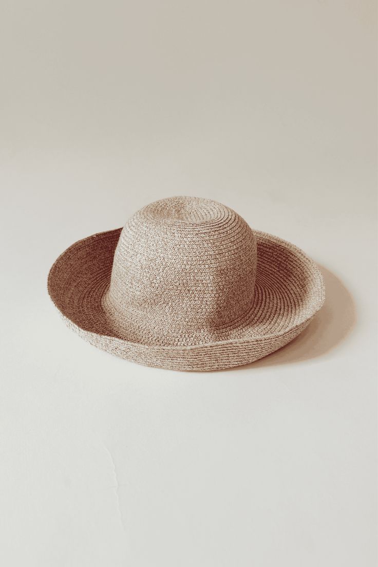 Whether you're attending rowing regattas, enjoying summer picnics, or leisurely drifting down the river, our woven raffia straw hat is the perfect companion. Featuring a timeless dome boater style with a charming flipped edge, it effortlessly combines elegance with a laid-back vibe. This is the epitome of the relaxed yet refined look we're all embracing this year. COUTONIC VINTAGE COLLECTION The COUTONIC Vintage Collection is not just a fashion collection; it's a sustainability-conscious homage Spring Coastal Boater Hat Made Of Toquilla Straw, Woven Sun Hat For Picnic, Coastal Straw Sun Hat For Spring, Straw Coastal Sun Hat For Spring, Spring Coastal Straw Sun Hat, Flat Brim Straw Hat For Picnic, Spring Coastal Boater Hat In Straw, Vacation Straw Hat With Woven Details, Woven Sun Hat For Spring Garden Party