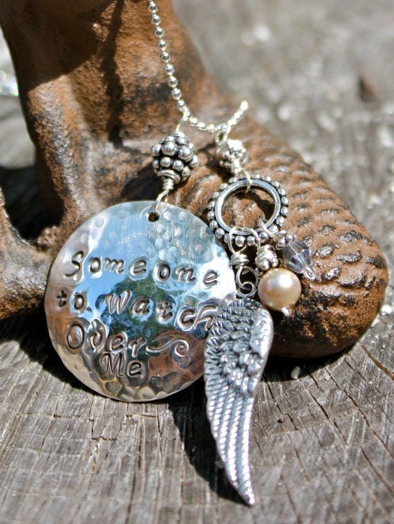 The "Someone To Watch Over Me" Necklace is from the Mermaid Tears Jewelry "Memories of Lost Love Collection". The sterling silver disc is approximately 1" and is hand lettered. The necklace is adorn with a sterling silver angel wing hanging from your choice of a heart or circular link. You may choose the birthstone(s) to be included in memory of the person that passed away. *Some people select to represent themselves and the person that passed. I am happy to help with stone selections.  *Please note: The color of the beading in the necklace will be silver and clear unless specified by the customer.  Charms may vary slightly according to availability. This bracelet is also made using Swarovski crystal birthstones and a sterling heart and angel wing charm.  You may choose up to TWO Birthston Silver Memorial Necklace, Hand Stamped Silver Pendant Jewelry, Silver Metal Memorial Necklace, Personalized Metal Jewelry For Memorial, Meaningful Silver Jewelry Stamped 925, Meaningful Silver 925 Stamped Jewelry, Silver Metal Necklace For Memorial, Spiritual Hand Stamped Jewelry For Anniversary, Memorial Hand Stamped Pendant Jewelry