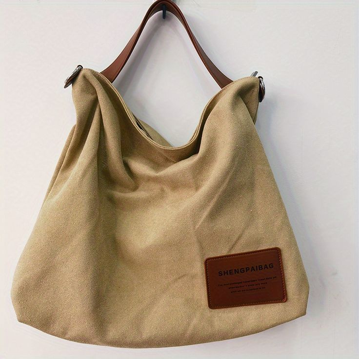 Simple Canvas Shoulder Bag, Large Capacity All-Match Satchel Bag, Trendy Crossbody Bag Creamy White Large Capacity Khaki Bucket Bag Satchel, Large Capacity Khaki Tote Bucket Bag, Khaki Bucket Bag With Large Capacity For Travel, Khaki Large Capacity Tote Bucket Bag, Khaki Travel Bucket Bag With Large Capacity, Khaki Rectangular Hobo Bag With Large Capacity, Khaki Large Capacity Rectangular Hobo Bag, Casual Beige Hobo Bag With Mobile Phone Pocket, Khaki Shoulder Bag With Large Capacity For Daily Use