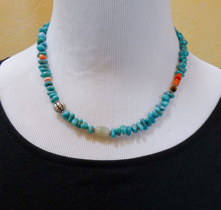 This Native American Spiny Oyster, Turquoise, Quartz, Tiger Eye and silver bead necklace is that signature necklace that you've been searching for. It is handcrafted into a beautiful array of color. This is one of a kind and made just for you! Perfect for dressing up a tee shirt and jeans wardrobe! 18 7/8" Cannot be adjusted Weight: 36 grams Cheap Handmade Turquoise Beaded Necklaces, Turquoise Bead Necklaces Novica, Cheap Southwestern Beaded Turquoise Necklace, Cheap Beaded Turquoise Necklace, One-of-a-kind Blue Turquoise Spiritual Necklace, Spiritual Blue One-of-a-kind Turquoise Necklace, Artisan Turquoise Necklace With Colorful Beads, Unique Hand-strung Turquoise Beaded Necklace, Artisan Hand-strung Turquoise Necklace Gift