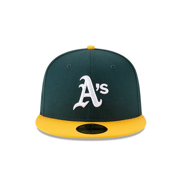 The Oakland Athletics World Series Side Patch 59FIFTY Fitted Cap features an embroidered Athletics logo at the front panels with a World Series Side patch at the left-wear side and a team color MLB Batterman logo at the rear. Throwback Flat Bill Fitted Hat For Fans, Throwback Fitted Flat Bill Hat, Throwback Fitted Hat With Flat Bill For Fans, Sports Fitted Hat With Logo Patch And Flat Bill, Six-panel Fitted Hat With Logo Patch For Sports Events, Throwback Flat Bill Trucker Hat For Baseball Season, Fitted Hat With Letter Patch For Sports Events, Throwback Fitted Hat With Flat Brim For Fan Gear, Throwback Flat Brim Fitted Hat For Fan Gear