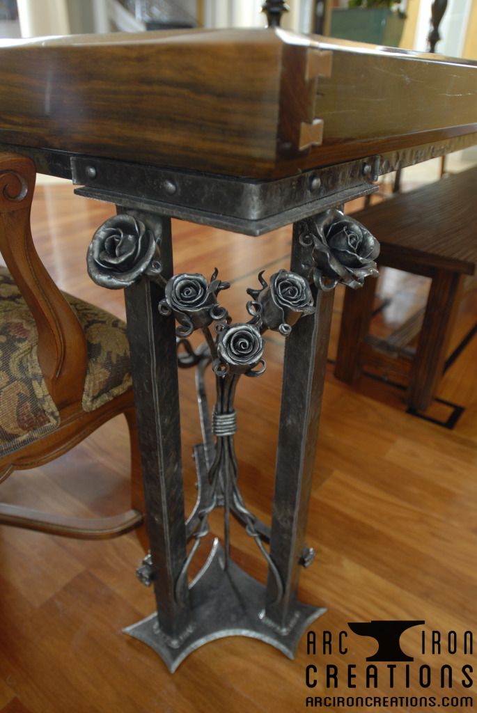 an old table and chairs in a room