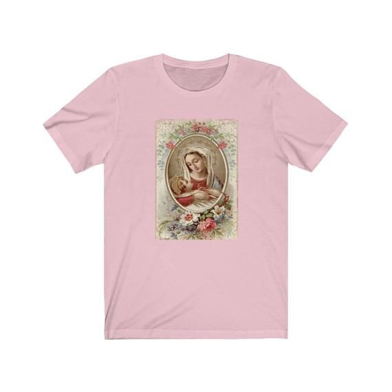 Beautiful shirt featuring the Virgin Mary and baby Jesus. This is the perfect gift for yourself or loved ones! 100% super soft cotton short sleeve Tshirt. Vintage + distressed design. ♡Measurements:Available in sizes S-3XLComfy, unisex tee. Roll up the sleeves and tie the shirt for an adorable fit!If you prefer a tighter fitting shirt, we recommend sizing down.*If you prefer women's fit or V-neck, leave us a note and we can customize for you!*Care Instructions:Machine wash: warmTumble dry: low h Pink Graphic Print T-shirt As Gift, Soft-washed Crew Neck T-shirt As Gift, Pink Short Sleeve T-shirt As A Gift, Pink Short Sleeve Shirt As A Gift, Our Lady Fatima, Lady Fatima, Christian Sweaters, Christ Shirts, Grandparents Ornament